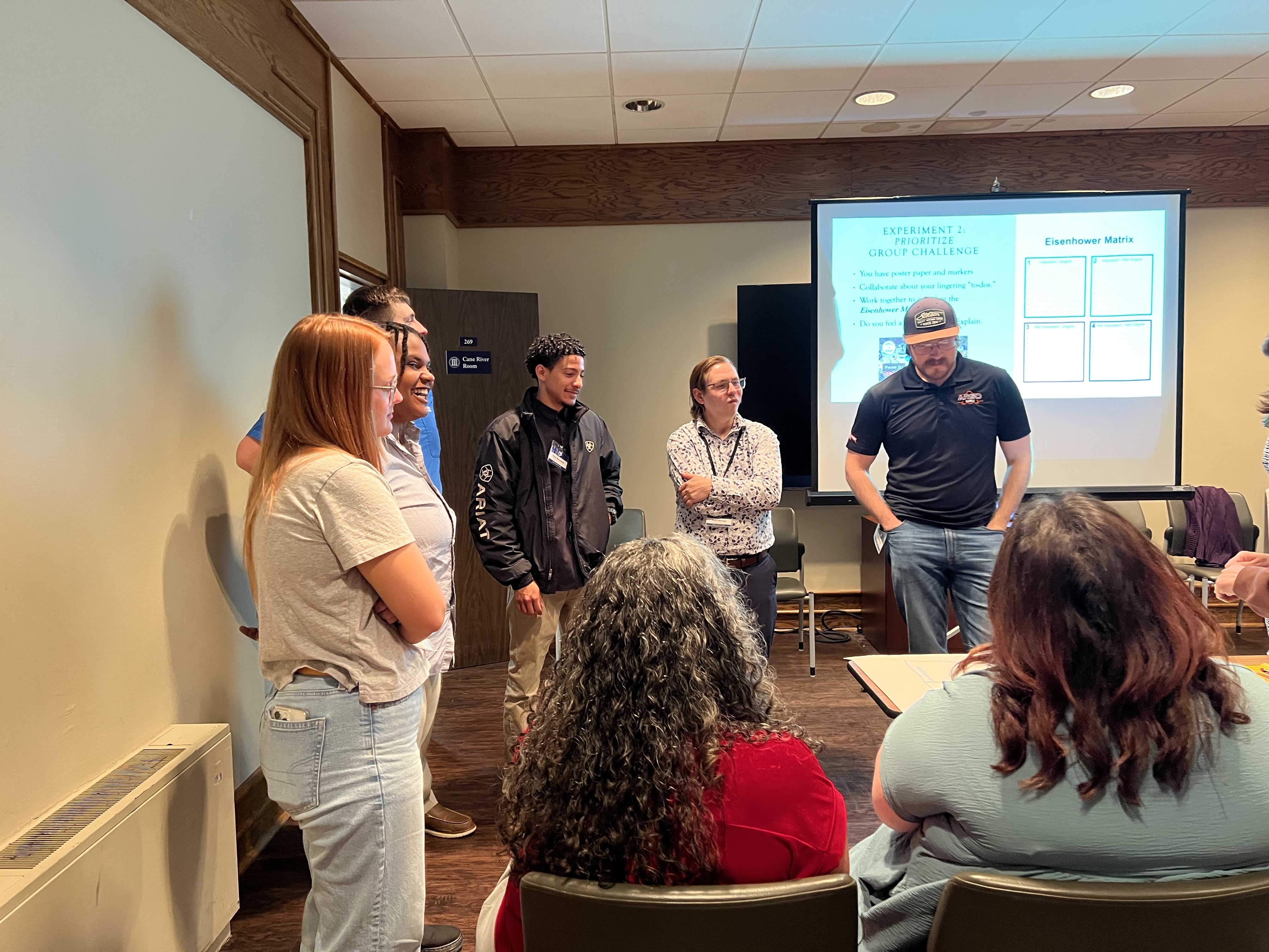 Conference participants collaborating during a workshop